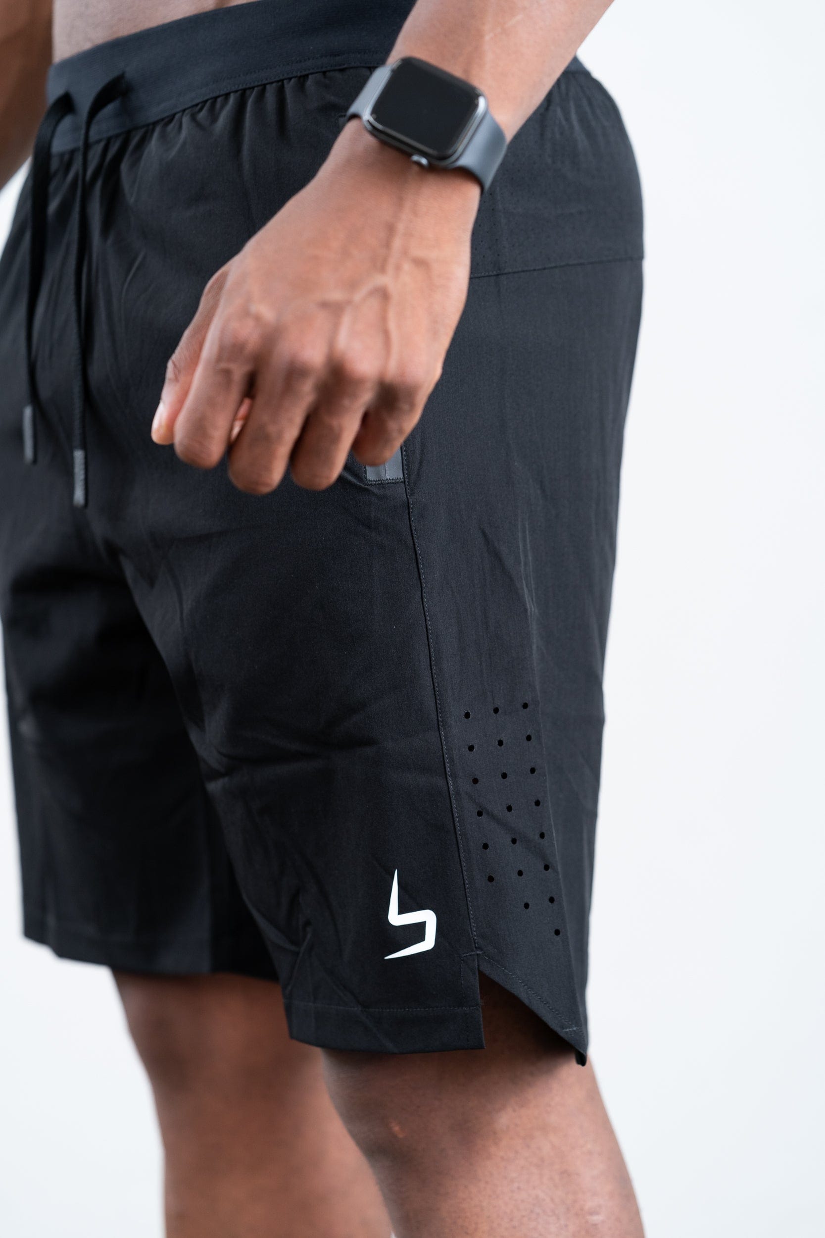 man wearing botthms black training sport short