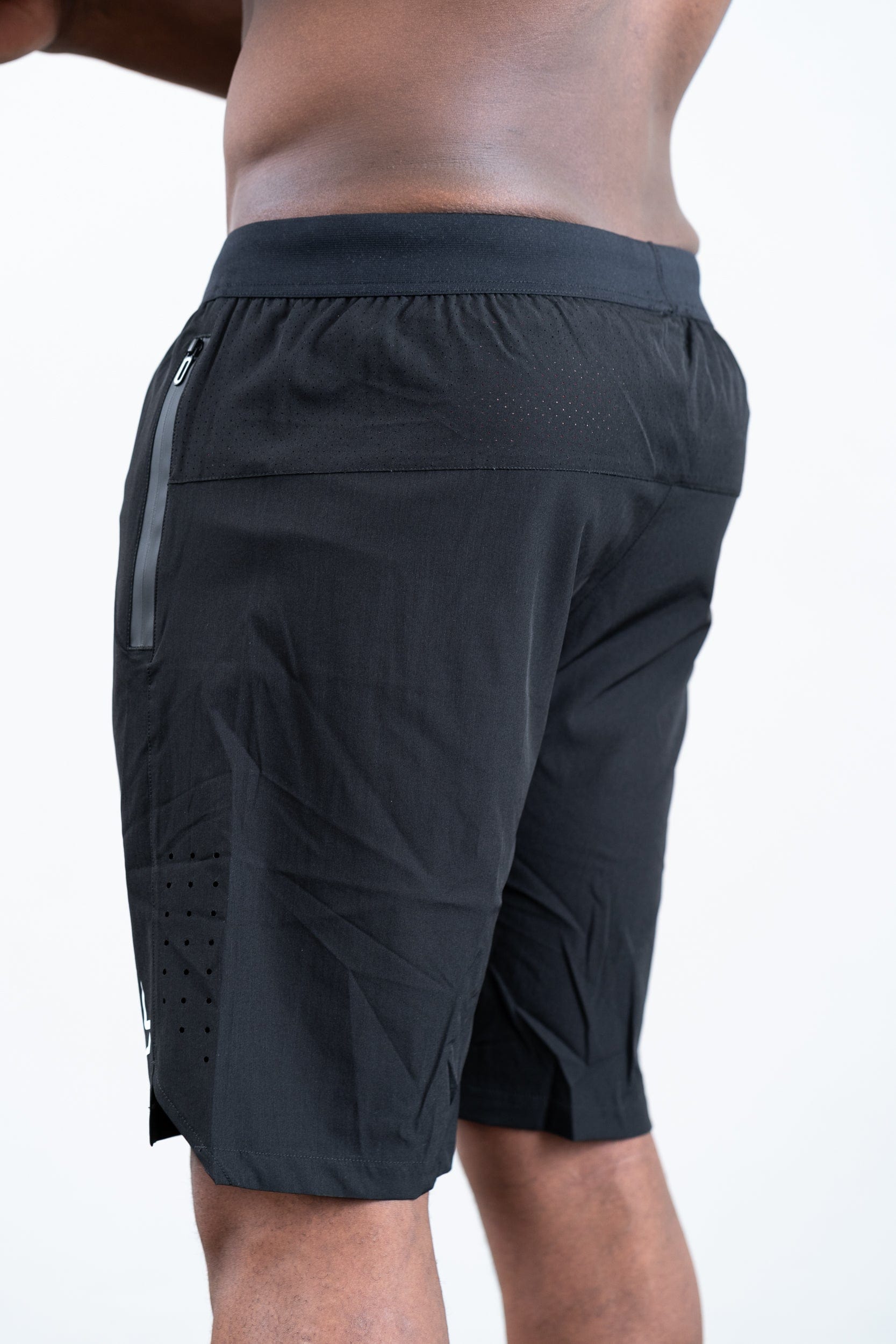 man wearing botthms black training sport short