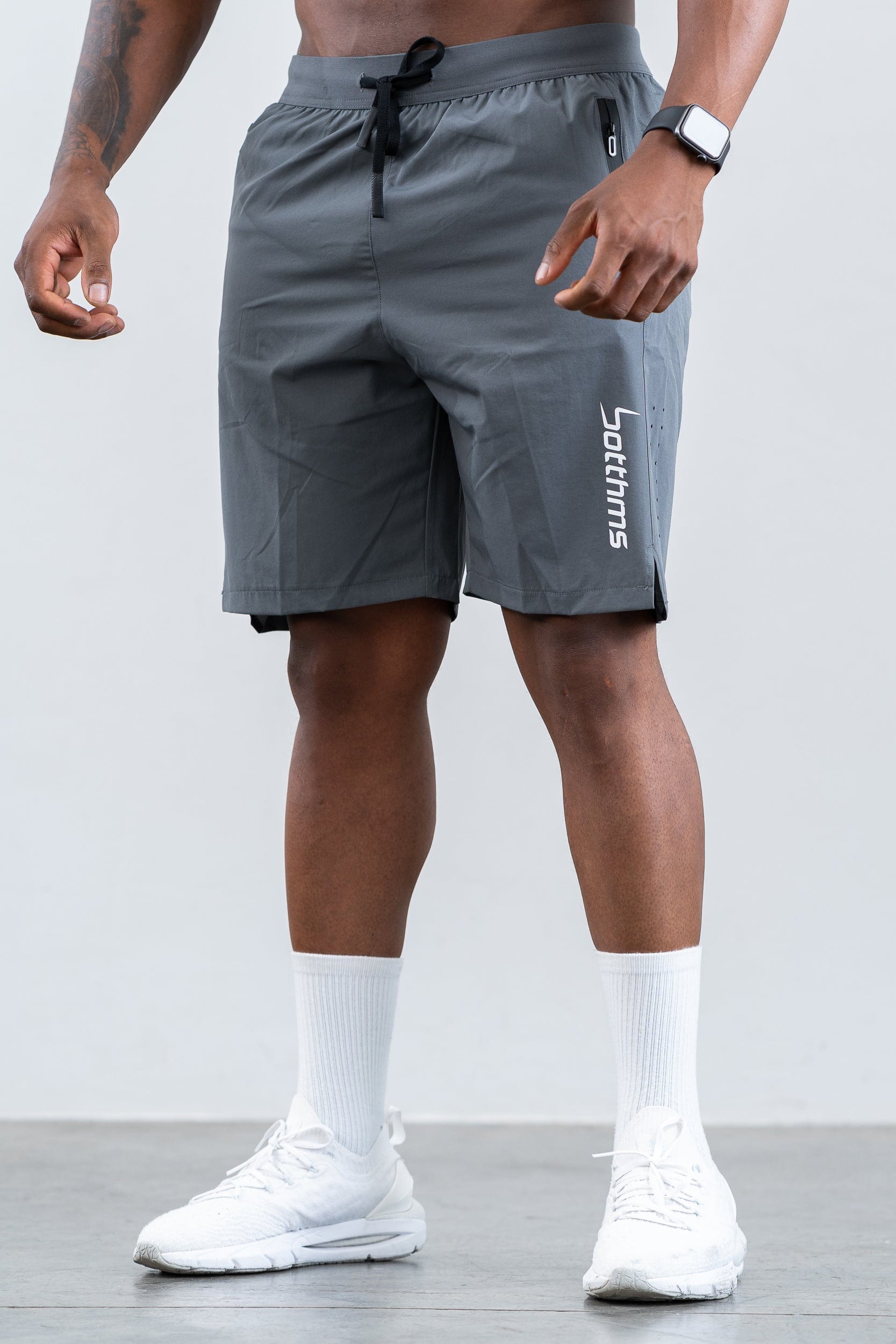 man wearing botthms dark gray training sport short