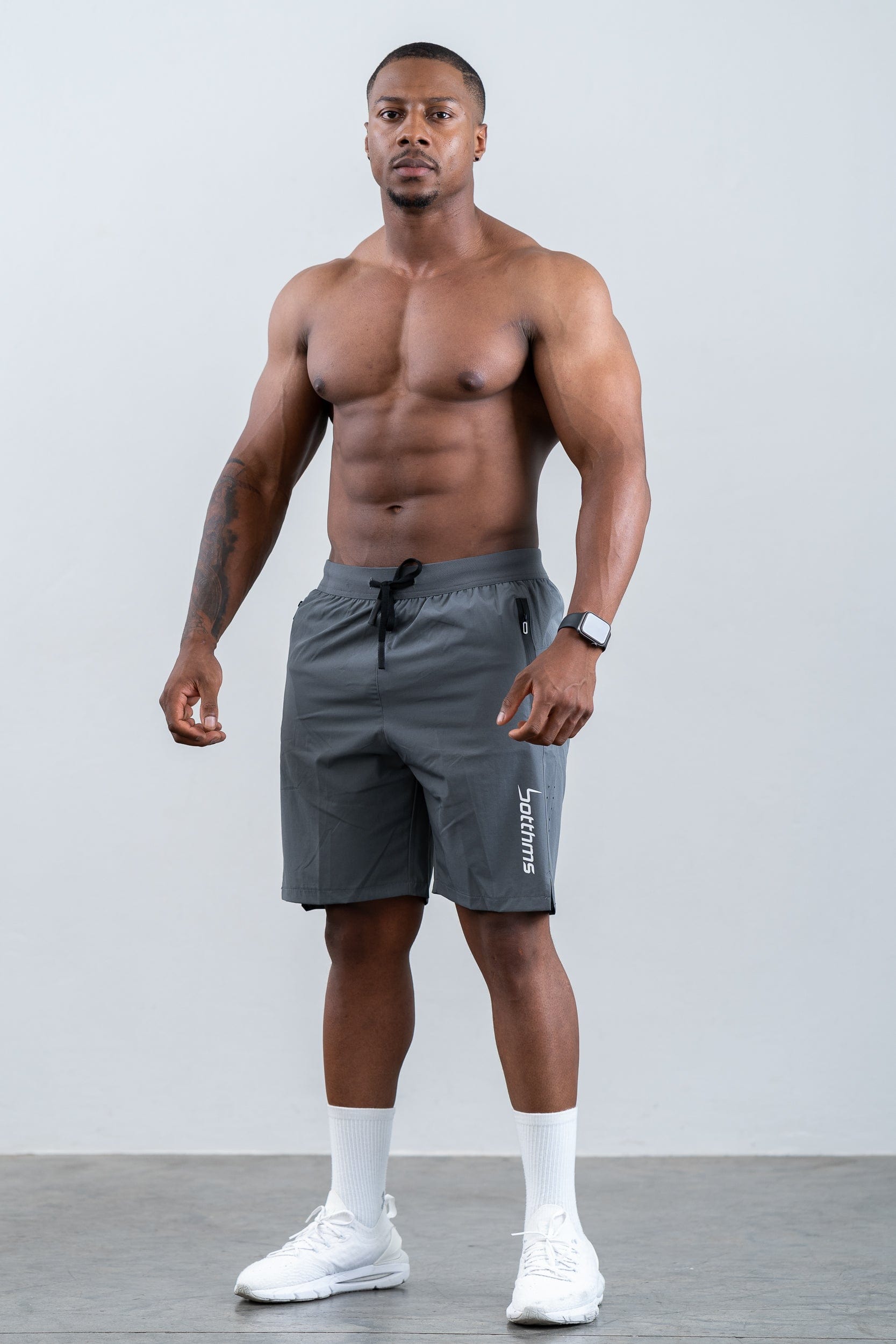 man wearing botthms dark gray training sport short