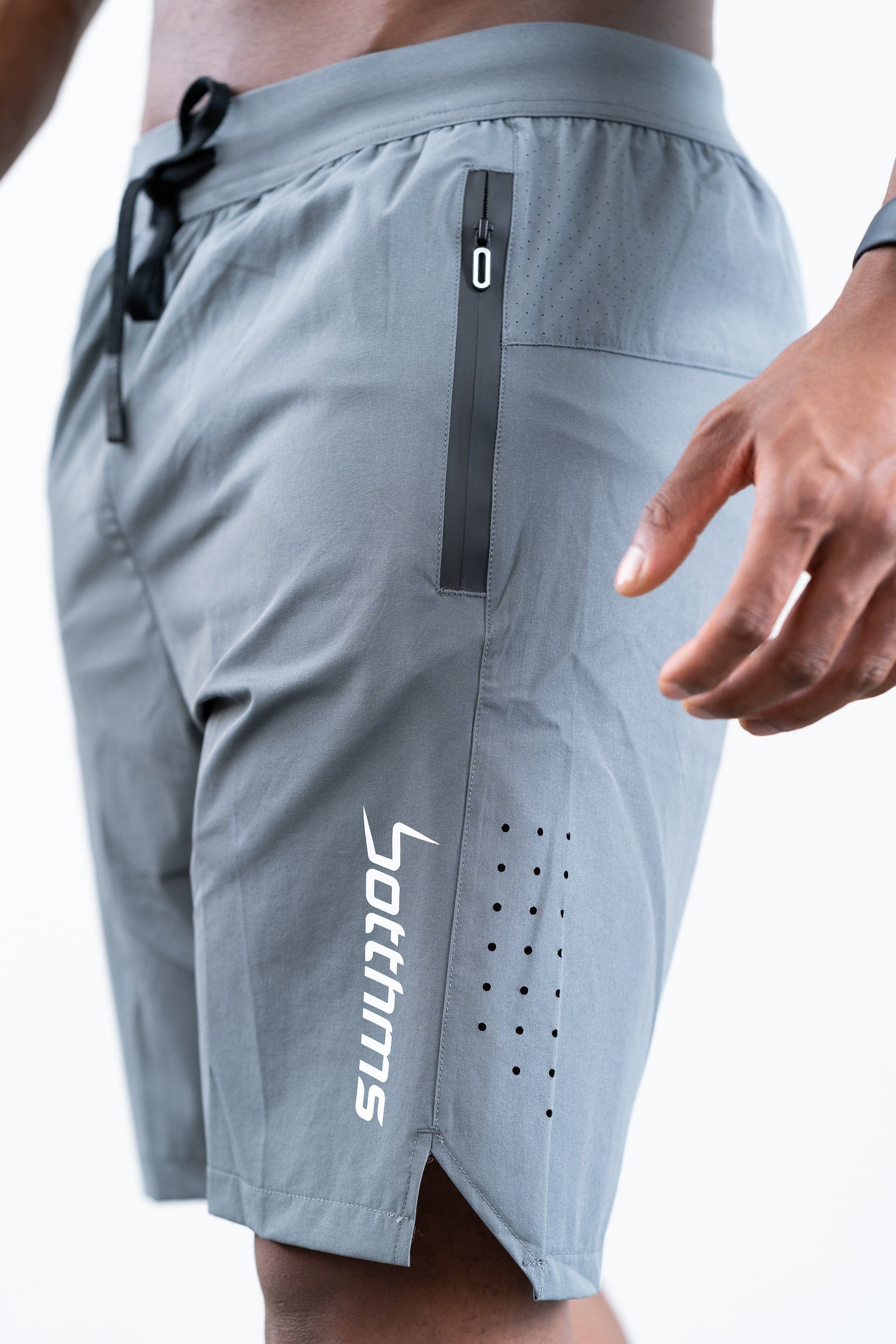 man wearing botthms gray training sport short