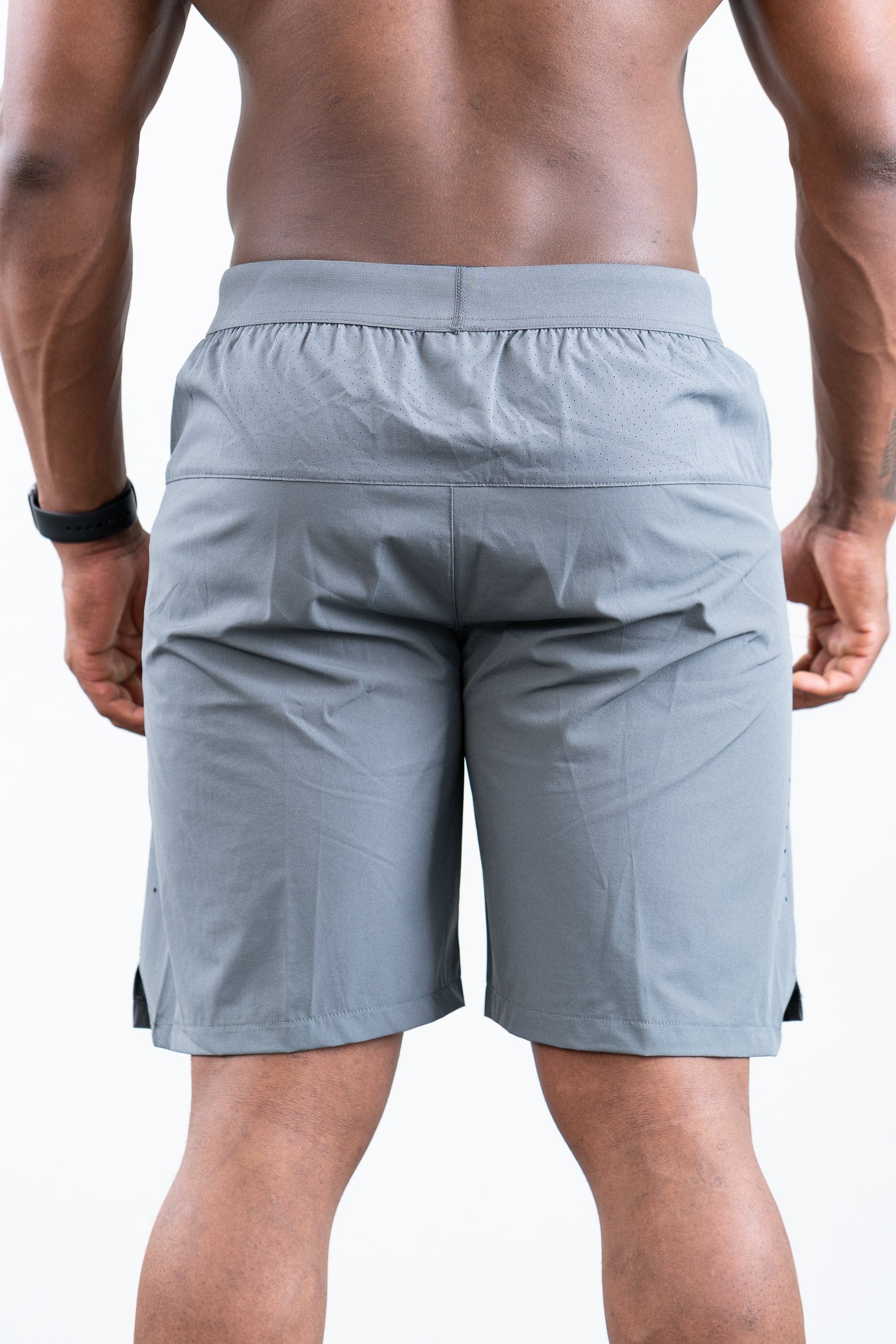 man wearing botthms gray training sport short